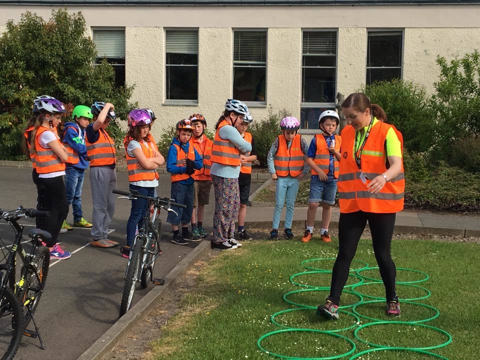 Marianne Berghuis working with Bikeability children and other volunteers in Fife 