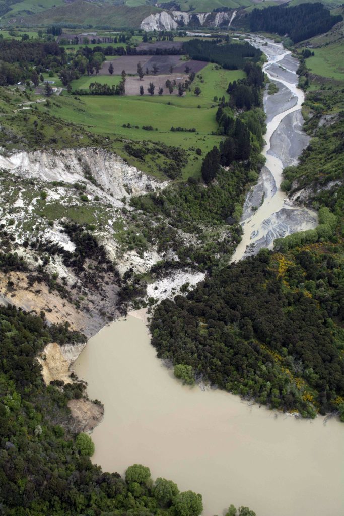 A lake caused by an earthquake slip forms on the Conway River near Kaikoura.