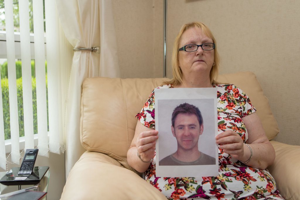 Kenneth's mum, Maryanne Jones with the e-ft image of her son in 2016.