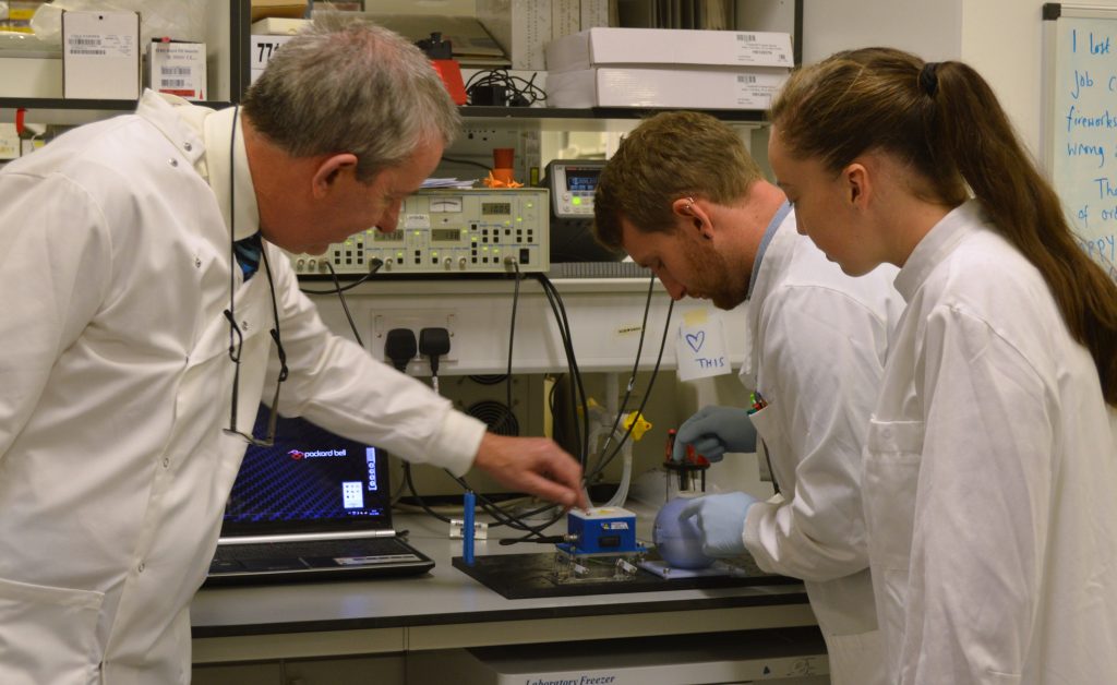 L to R - Stephen Gillespie, Robert Hammond and research assistant Kerry Falconer with the prototype SLIC device.