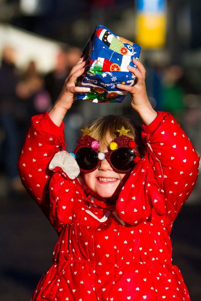 Charlotte Burns (aged 3, from Perth) complete with Christmas sunglasses and her first gift from Santa