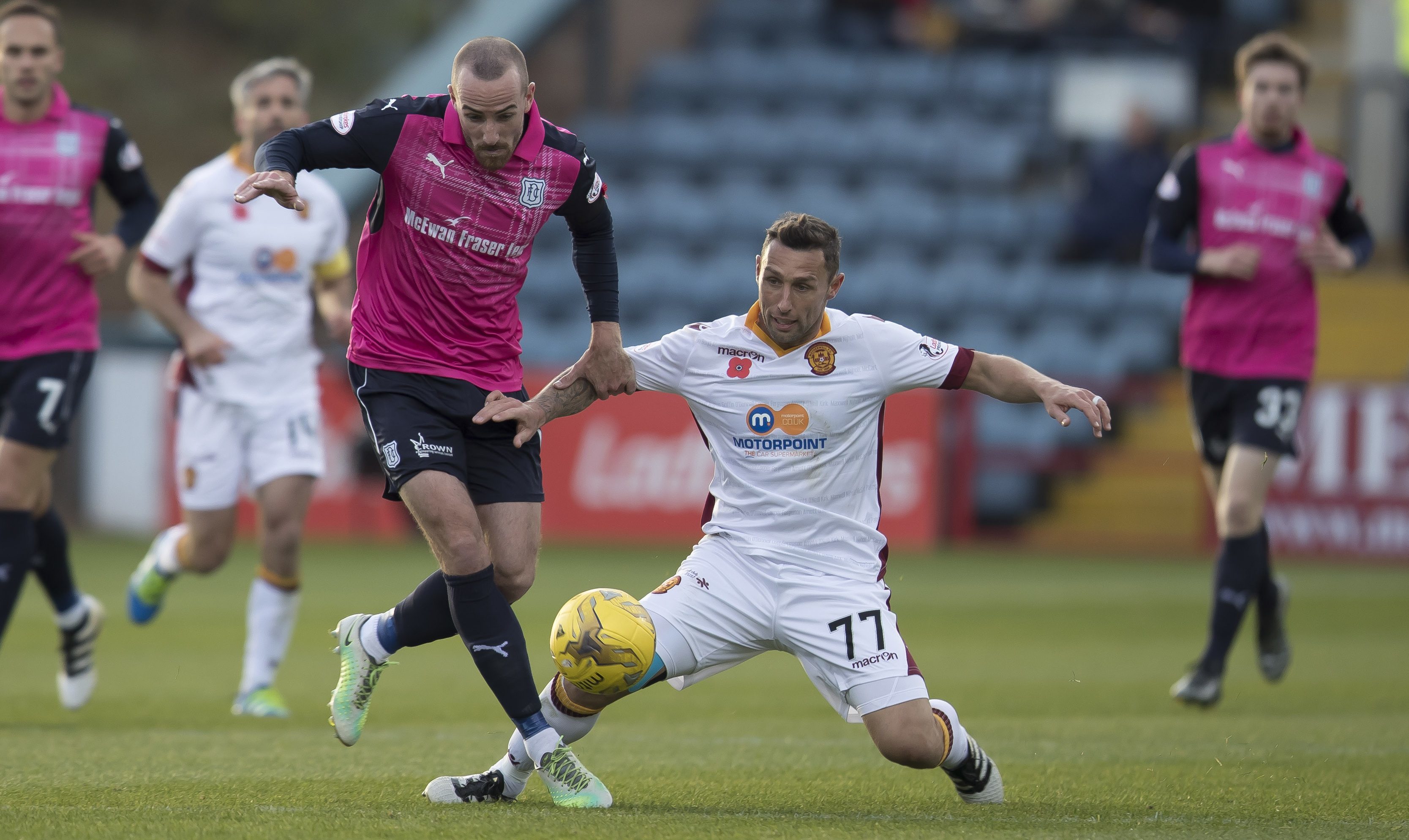 Action from Dens Park.