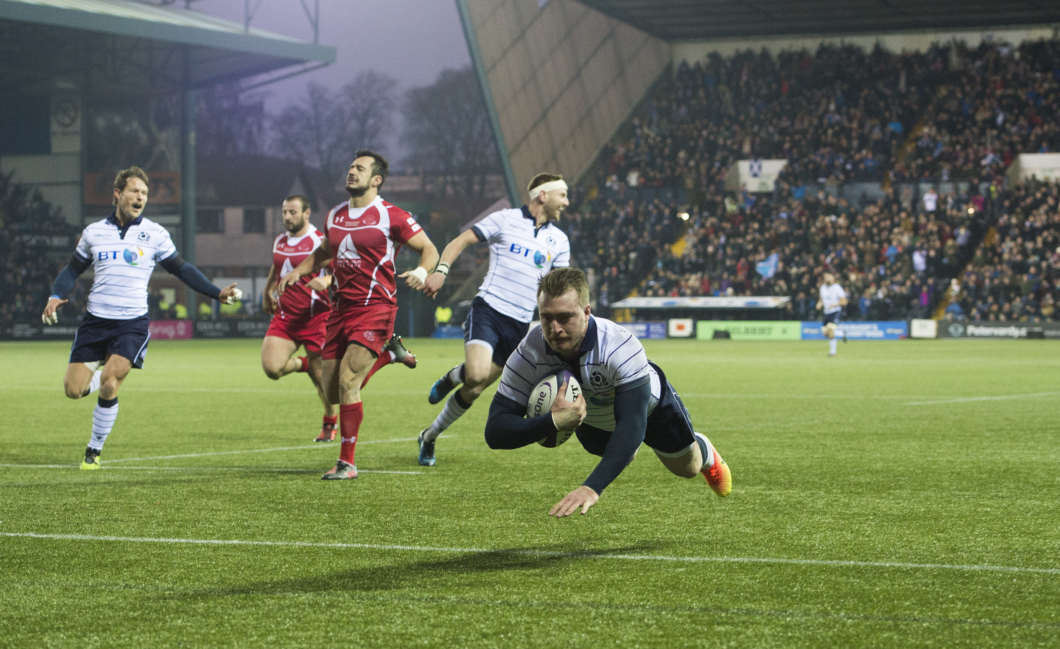 Stuart Hogg scores his second and Scotland's sixth try against Georgia at Kilmarnock.
