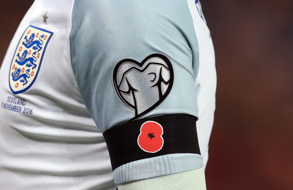 File photo dated 11-11-2016 of A detailed view of Wayne Rooney's black armband with a poppy on. PRESS ASSOCIATION Photo. Issue date: Thursday November 17, 2016. FIFA has announced it has opened disciplinary proceedings against the Football Association and Scottish Football Association for the wearing of poppies during last week's World Cup qualifier. See PA story SOCCER Poppy. Photo credit should read Mike Egerton/PA Wire.