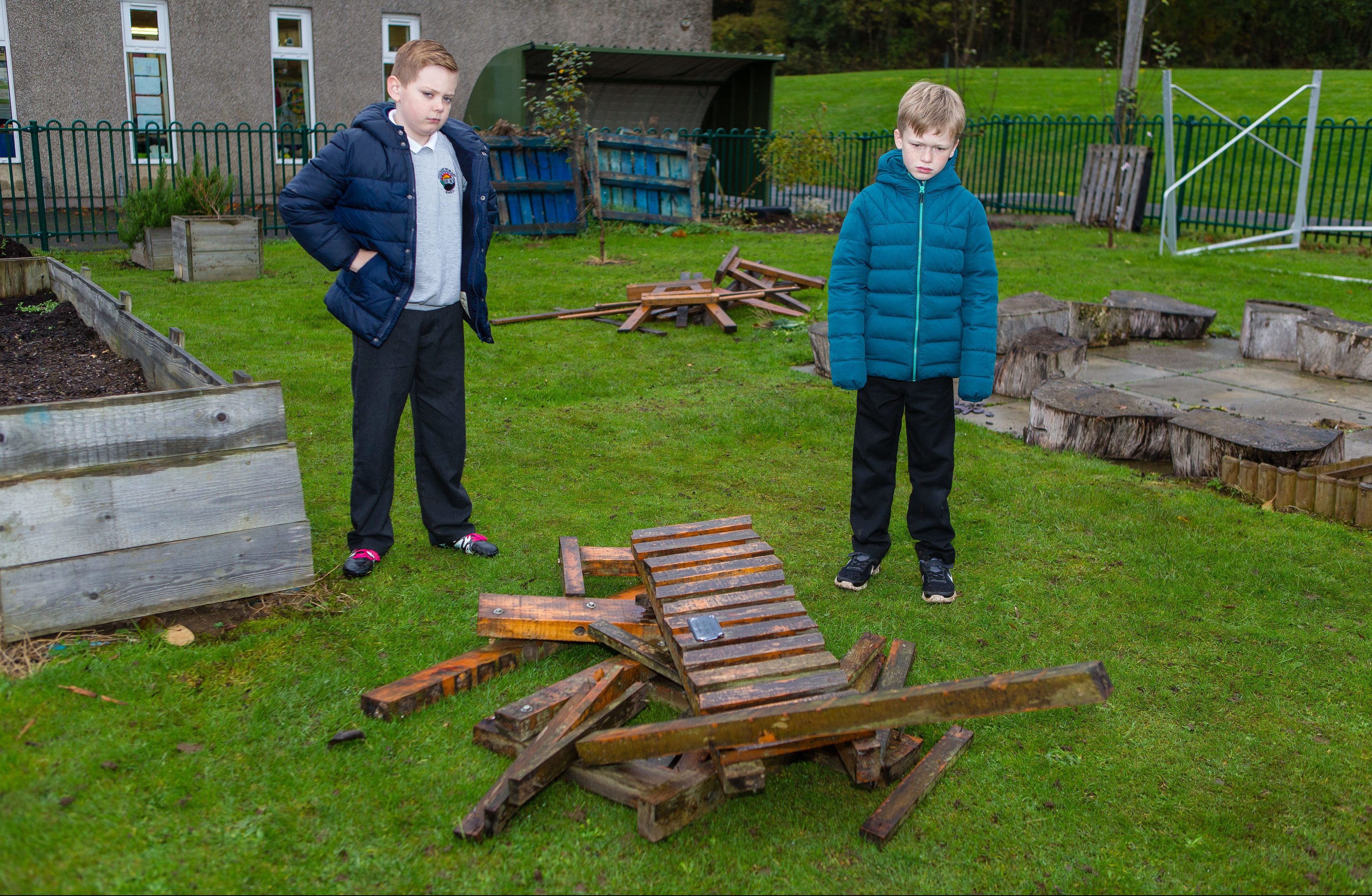 Pupils were devastated to find their communal garden destroyed by vandals earlier this month. Pictured are Sean Gilles (10) and Makenzie McLellan (9) in the gardens where the vandalism ruined all their hard work.