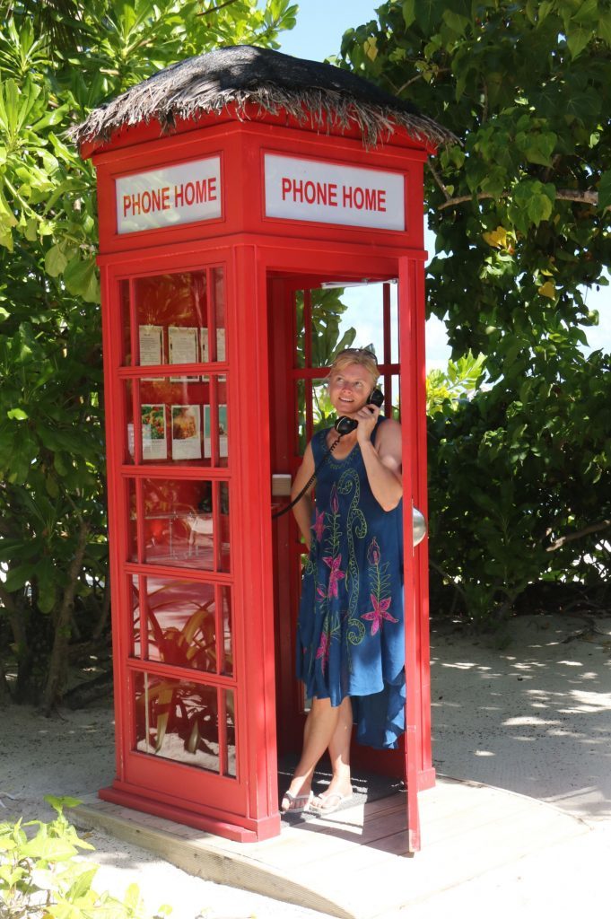 Karen in the complimentary phone box.