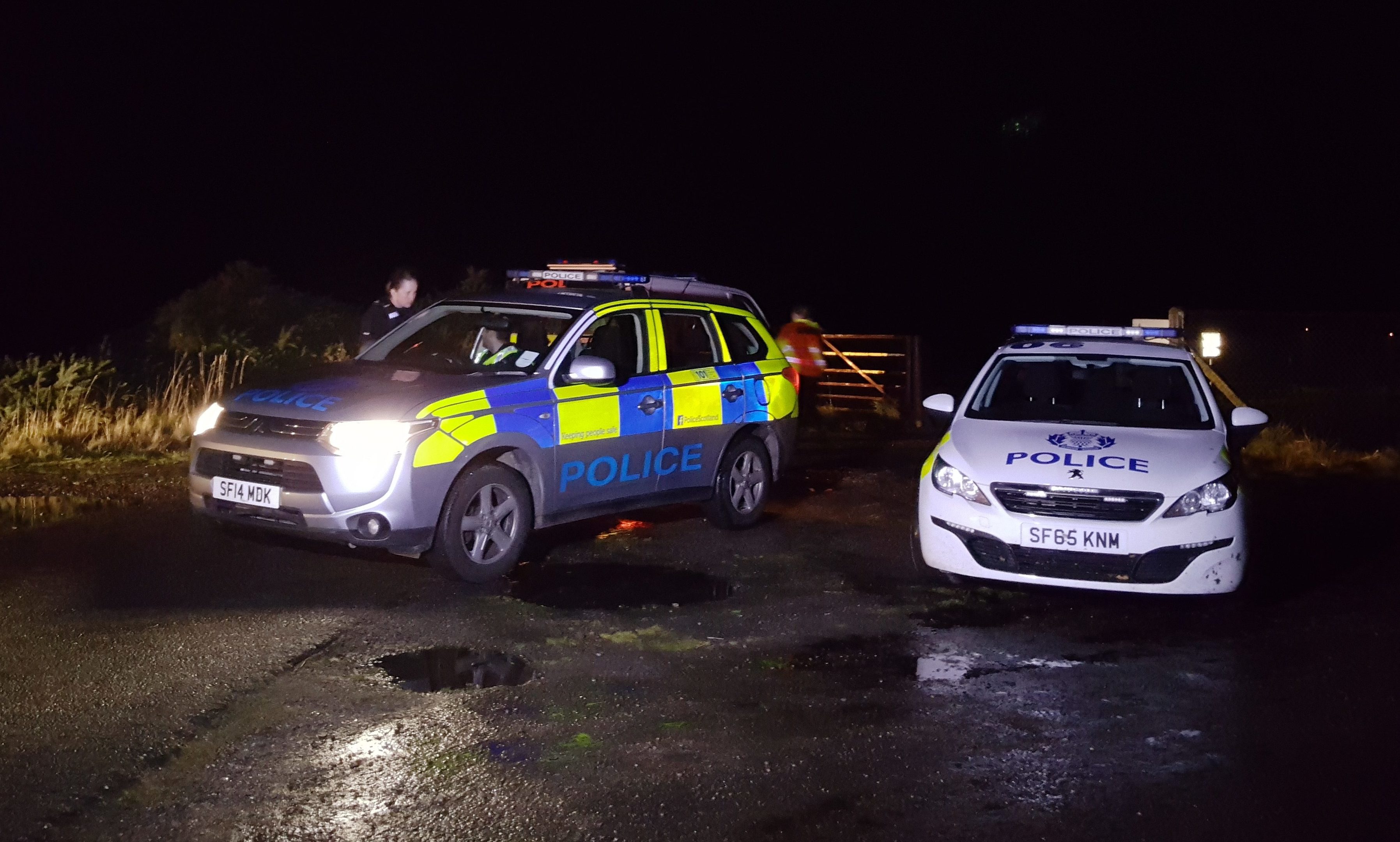 Police outside the base on Tuesday night.