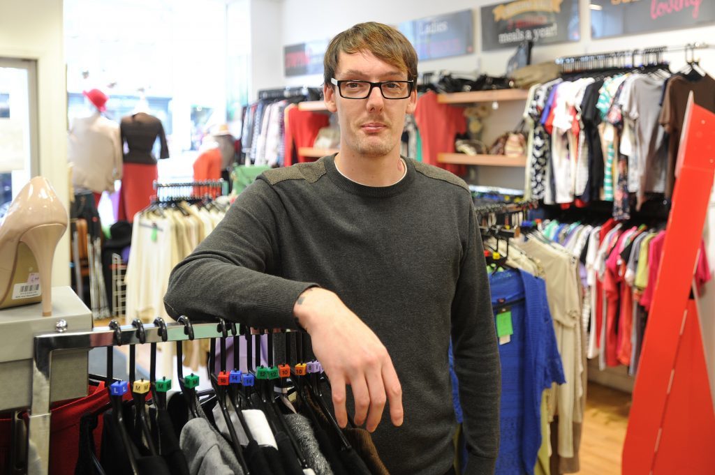  Brian Burnett, a sales assistant at the Salvation Army shop, High Street, Montrose, 