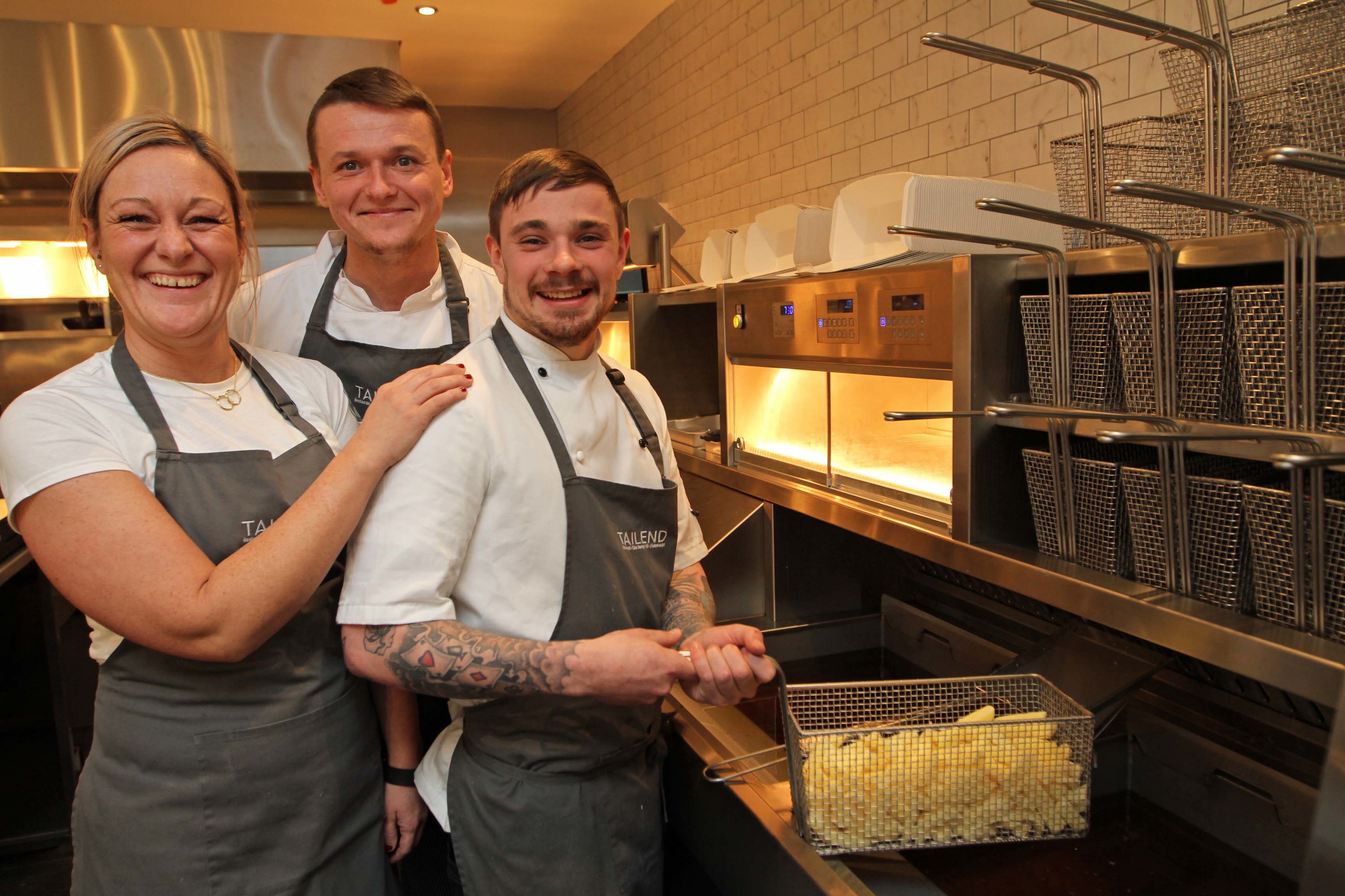 Staff at the Tailend featuring Katie Voigt, Ryszard Wlodarczak and Criss Green