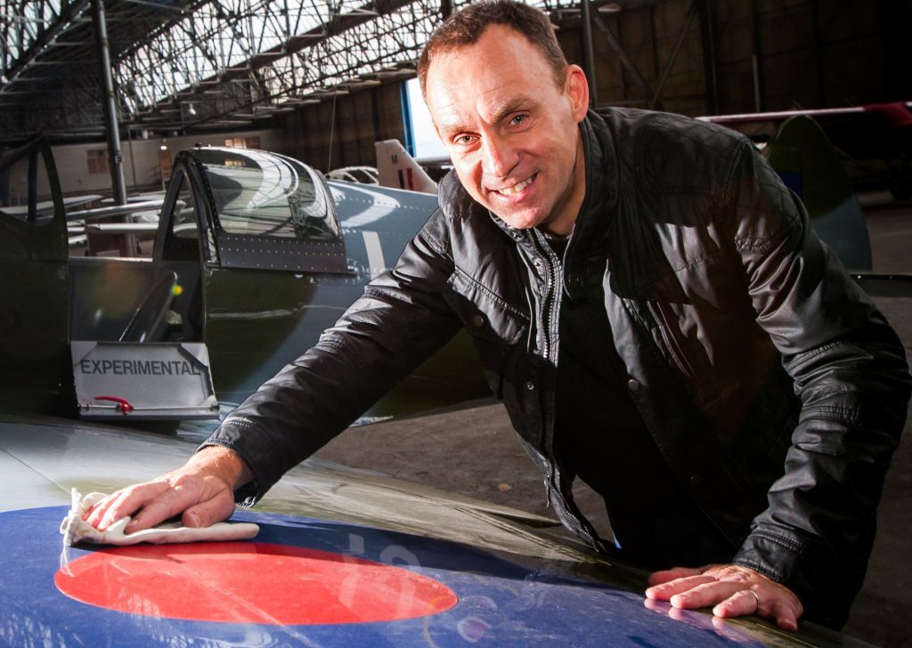 Iain Hutchison giving his Spitfire some TLC