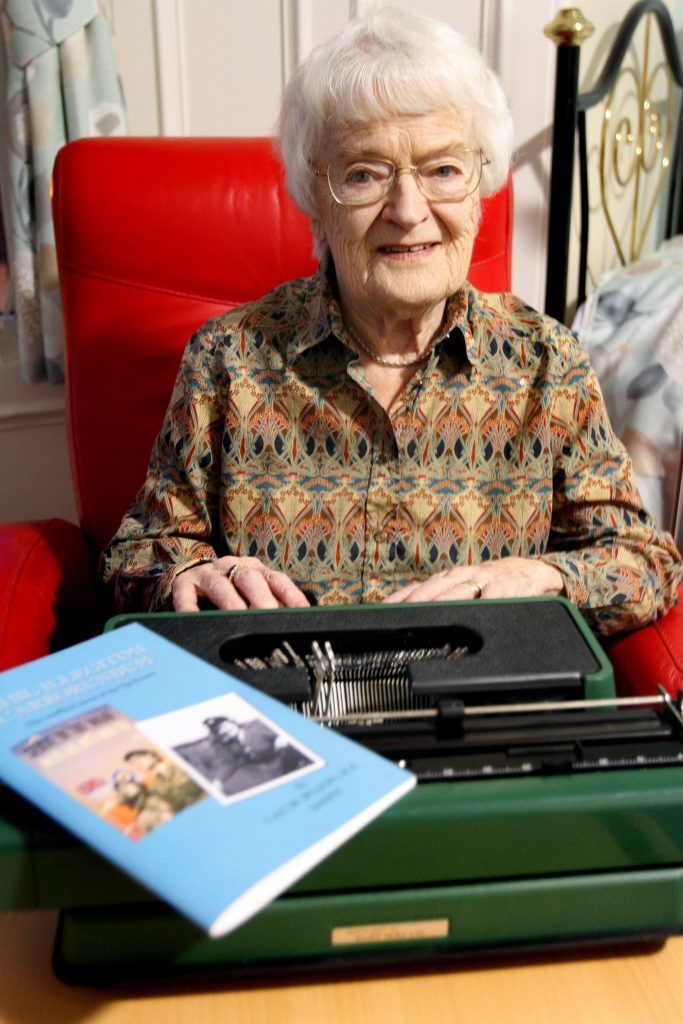 Mabel in 2014 with her beloved typewriter.