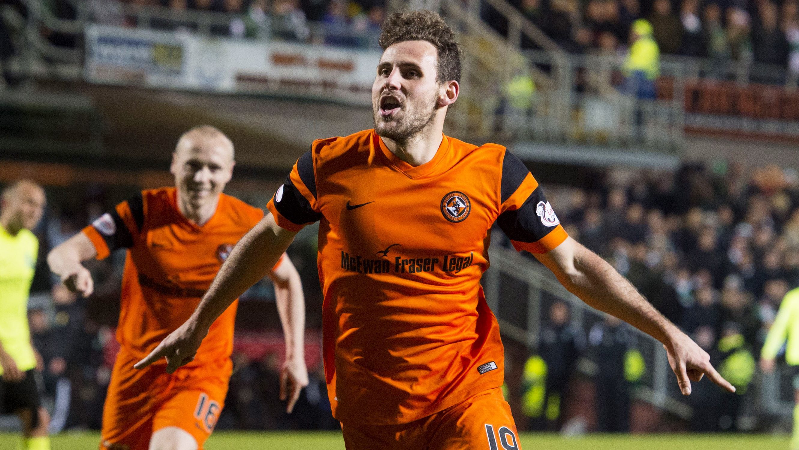 Tony Andreu celebrates scoring United's winner against Hibs.