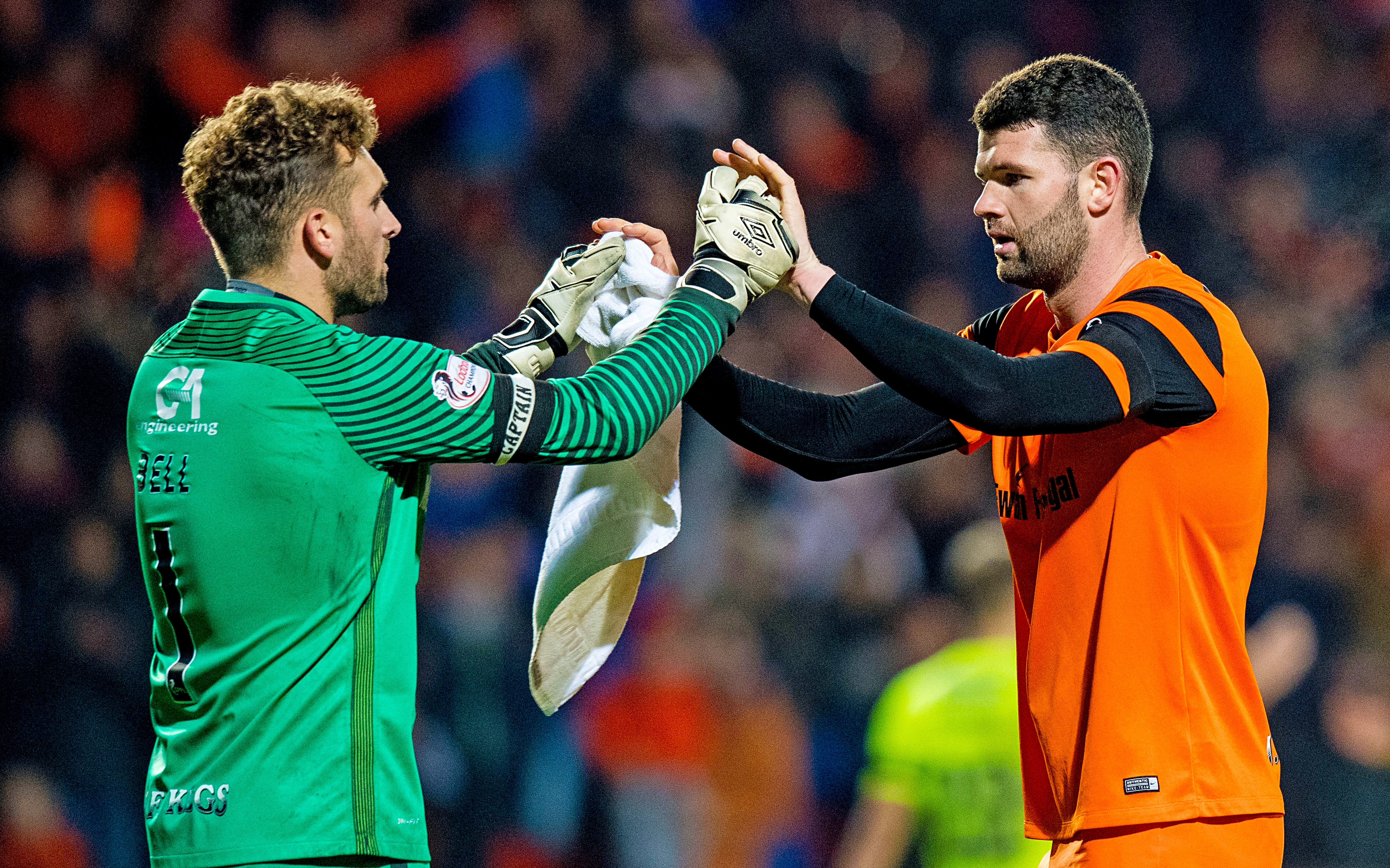 Cammy Bell celebrates with Mark Durnan.