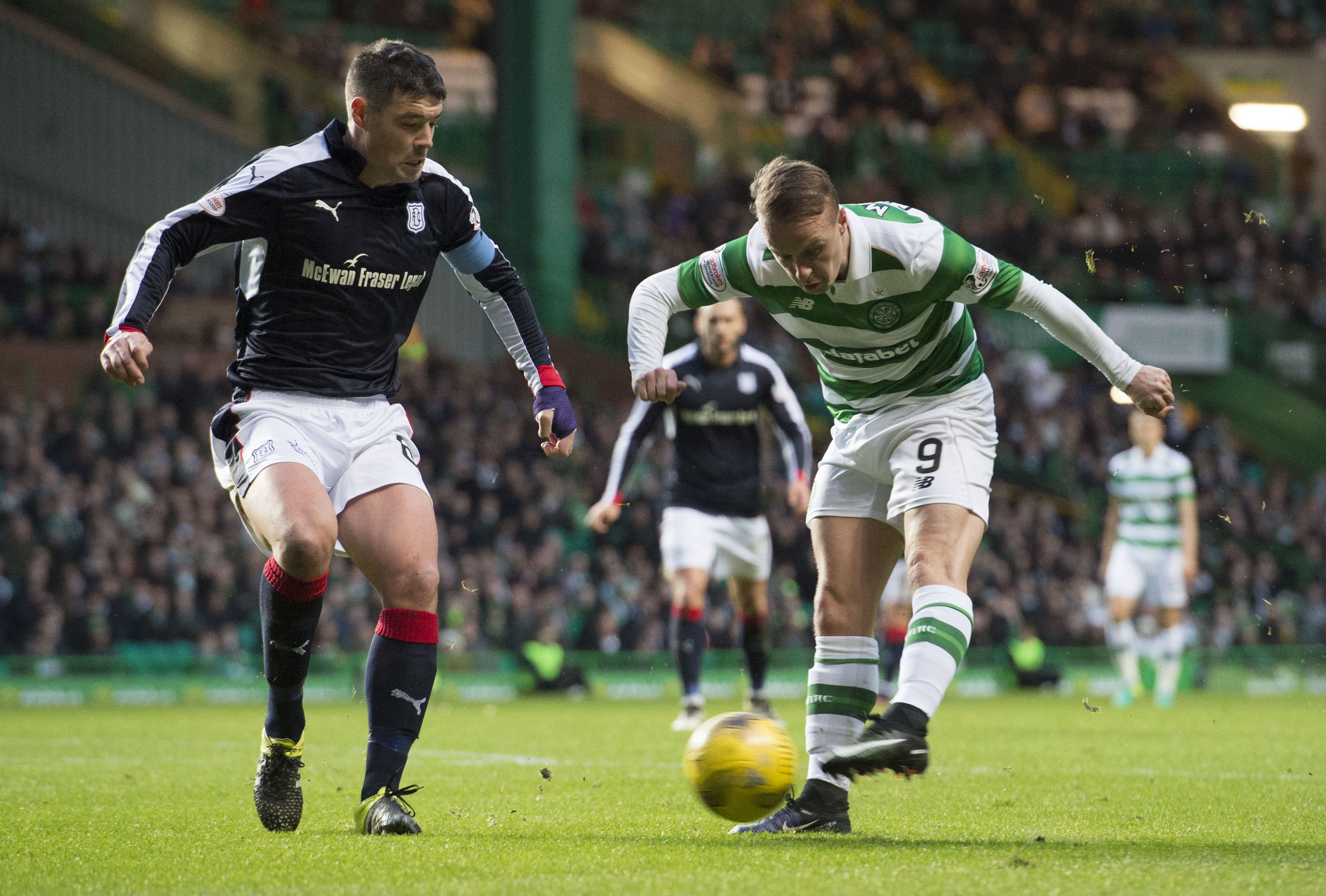 Celtic's Leigh Griffiths is closed down by Darren O'Dea.