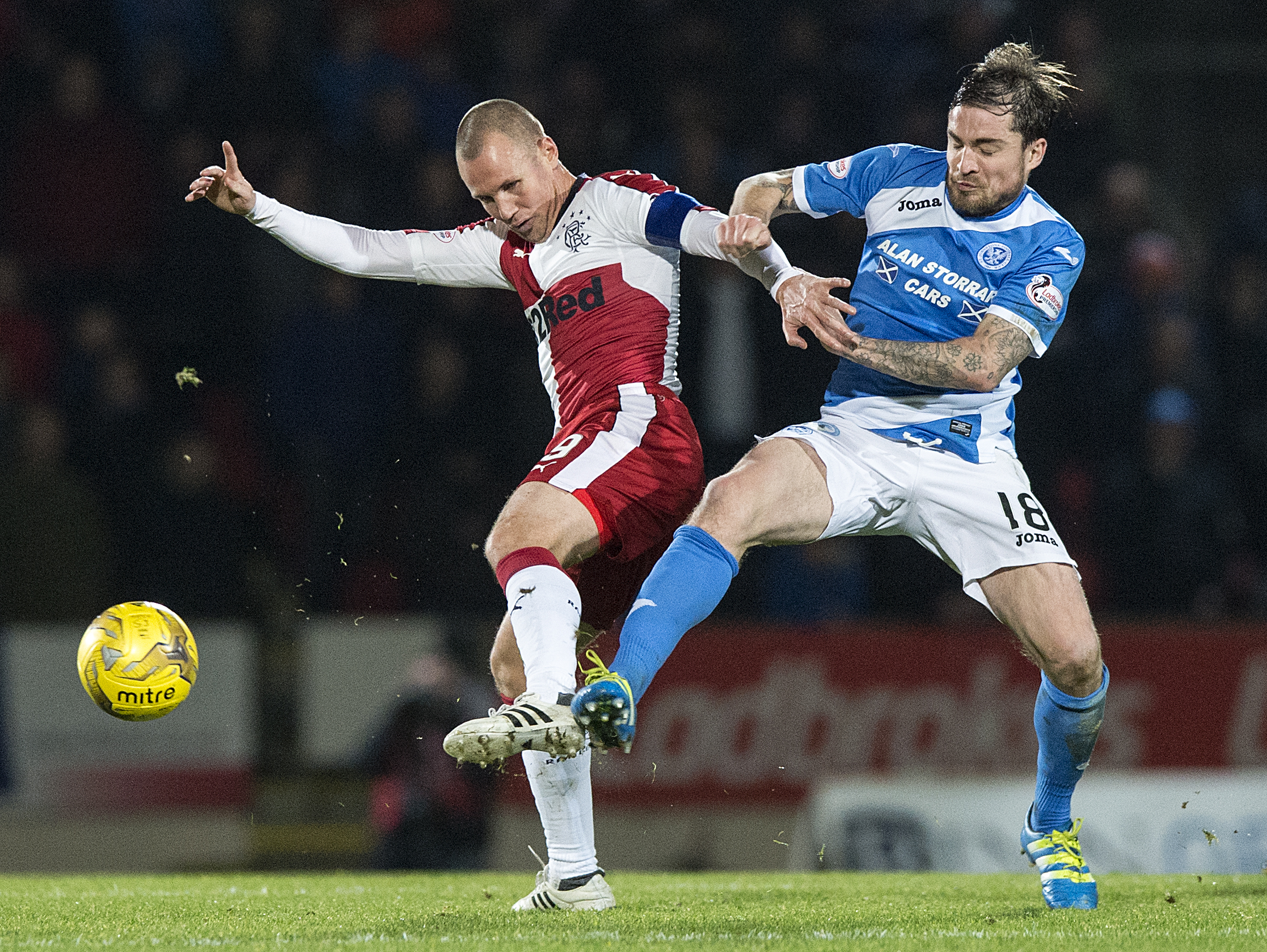 Paul Paton battles with Kenny Miller.