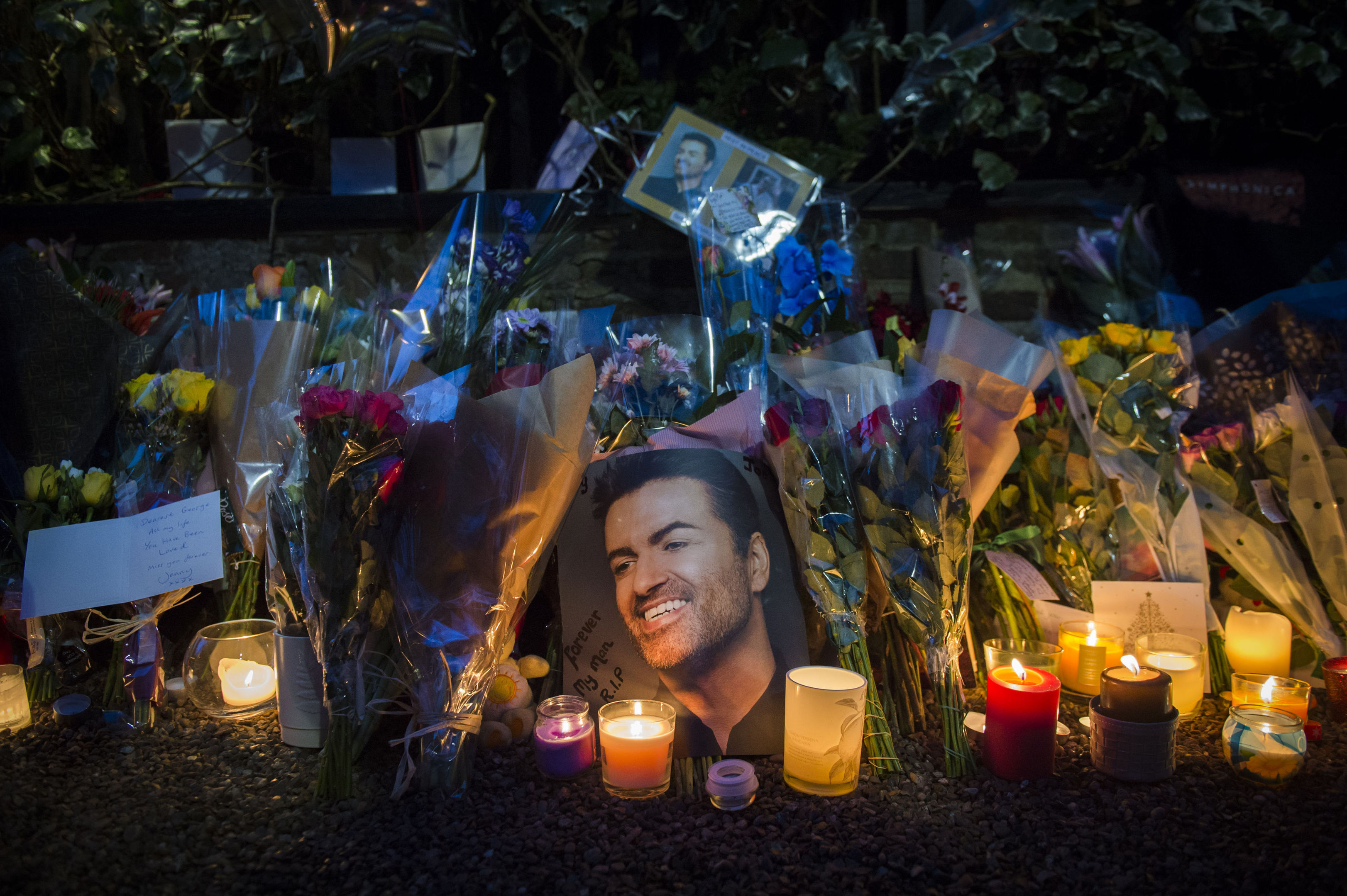 Tributes outside George Michael's house in Highgate, North London, UK, following the singer's death.