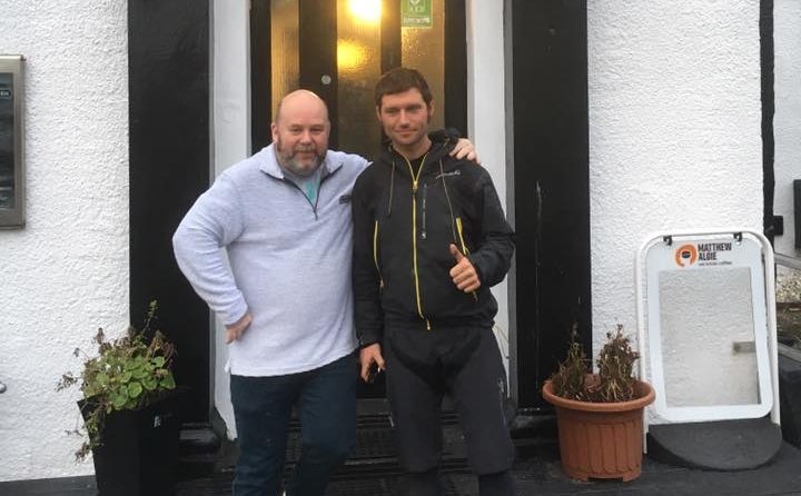 Gary Thompson and Martin outside the hotel.