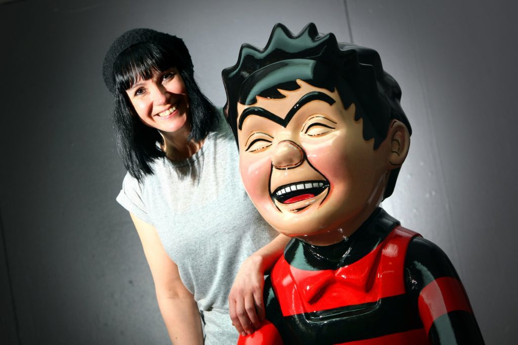 Suzanne Scott, art coordinator for Oor Wullie's Bucket Trail with one of the sculptures.