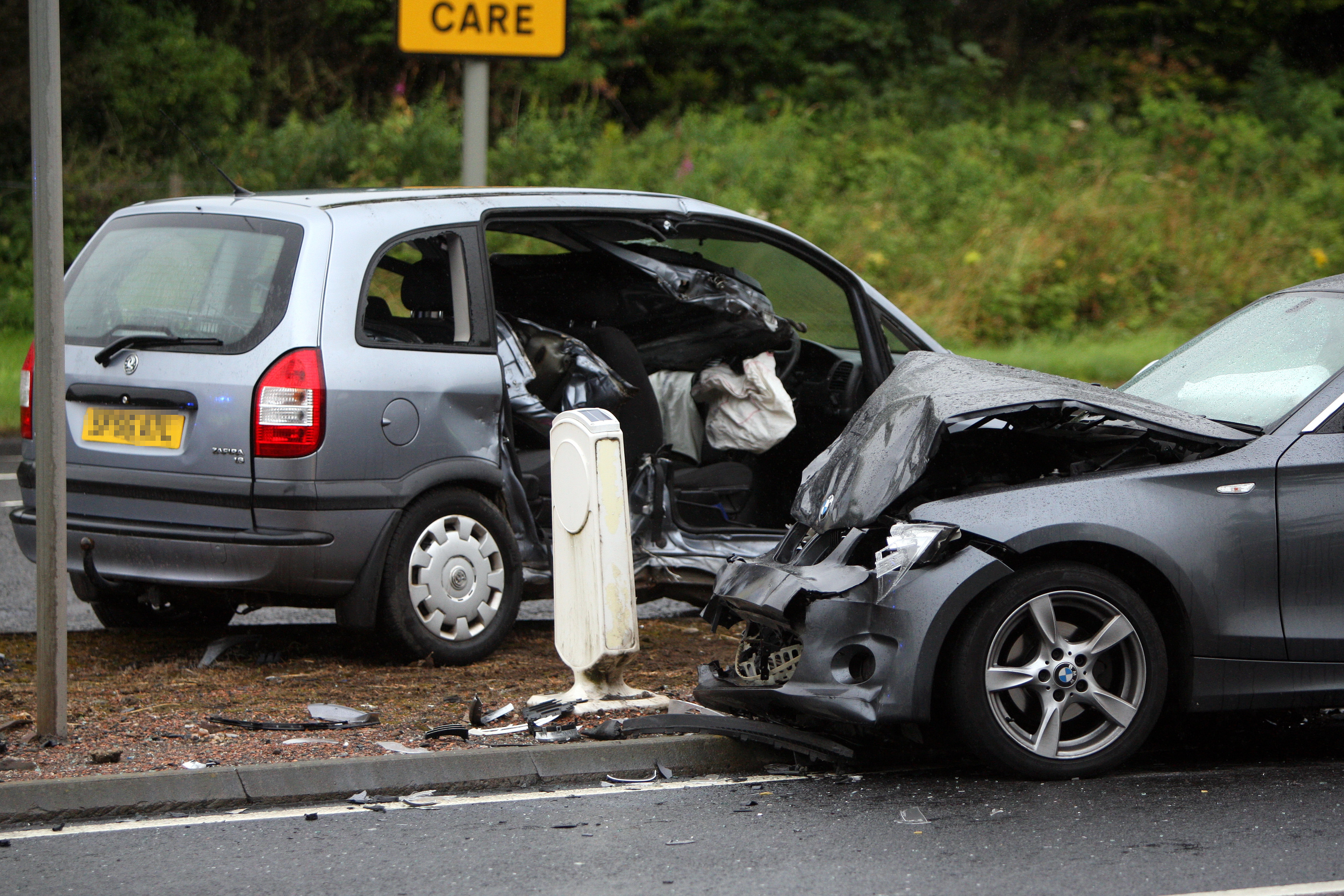 Mr Allan's BMW 1 series and Wilkie's Vauxhall at the scene.