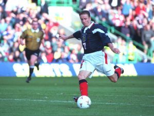 Kevin Gallacher in action for Scotland.