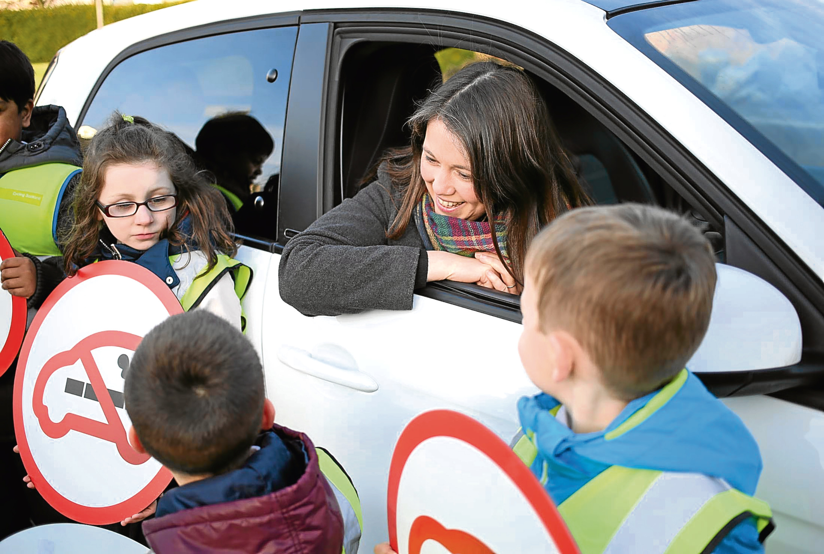 Aileen Campbell, Minister for Public Health and Sport, and some pupils from Edinburgh marked the day smoking in cars with children became illegal across Scotland in 2016