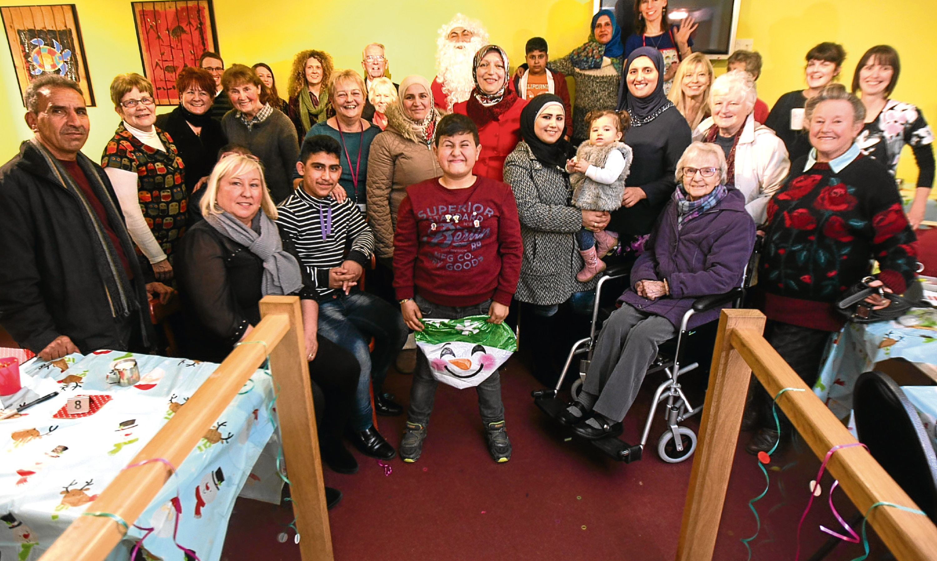 Syrian refugee families and the Polish Community get together to run a multicultural festive cafe in Arbroath. Alex worries about our reactions now compared to when we welcomed Italian immigrants such as his late neighbour into the country in the 1960s.