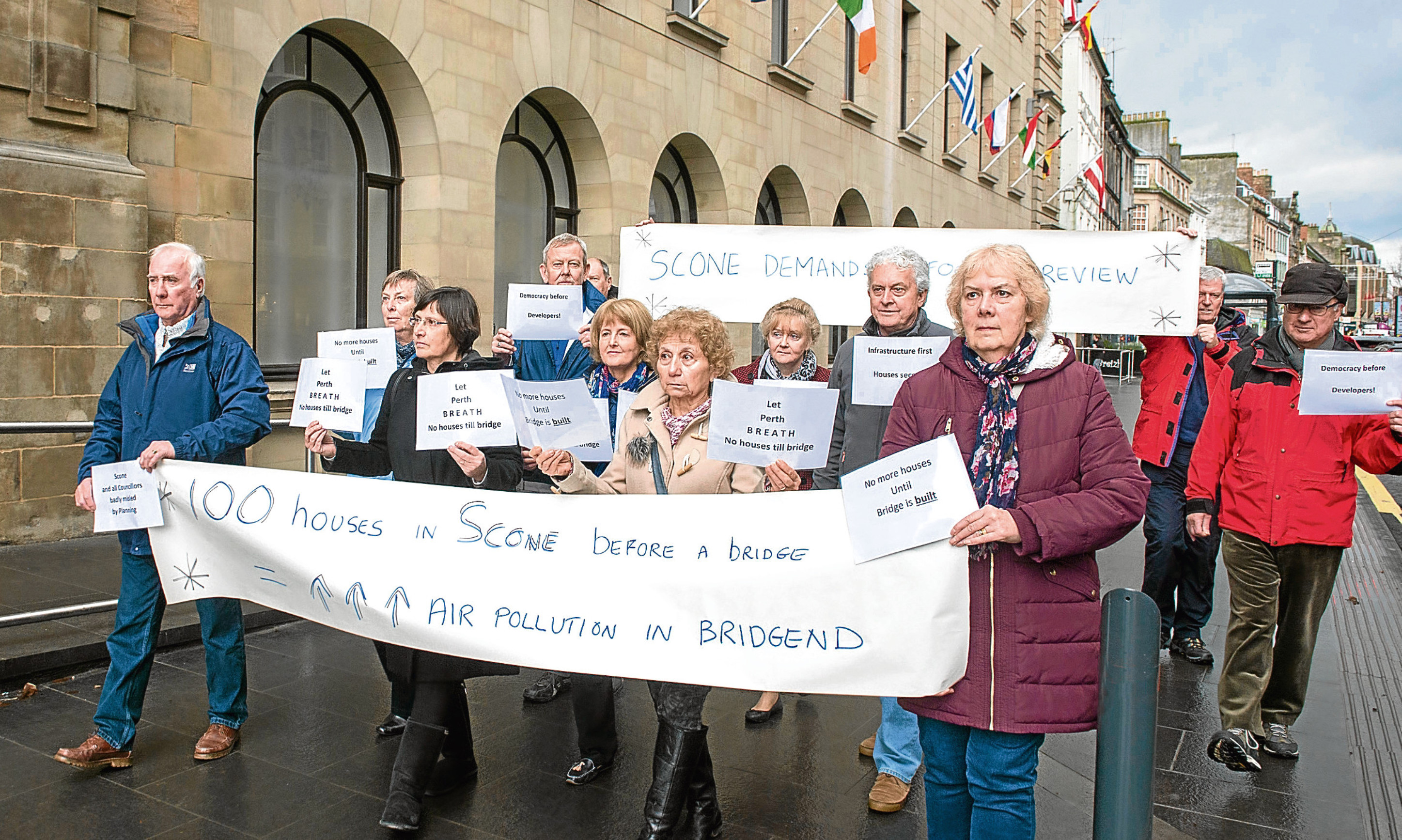 Scone residents protest about the housing proposal outside Perth and Kinross Council offices.