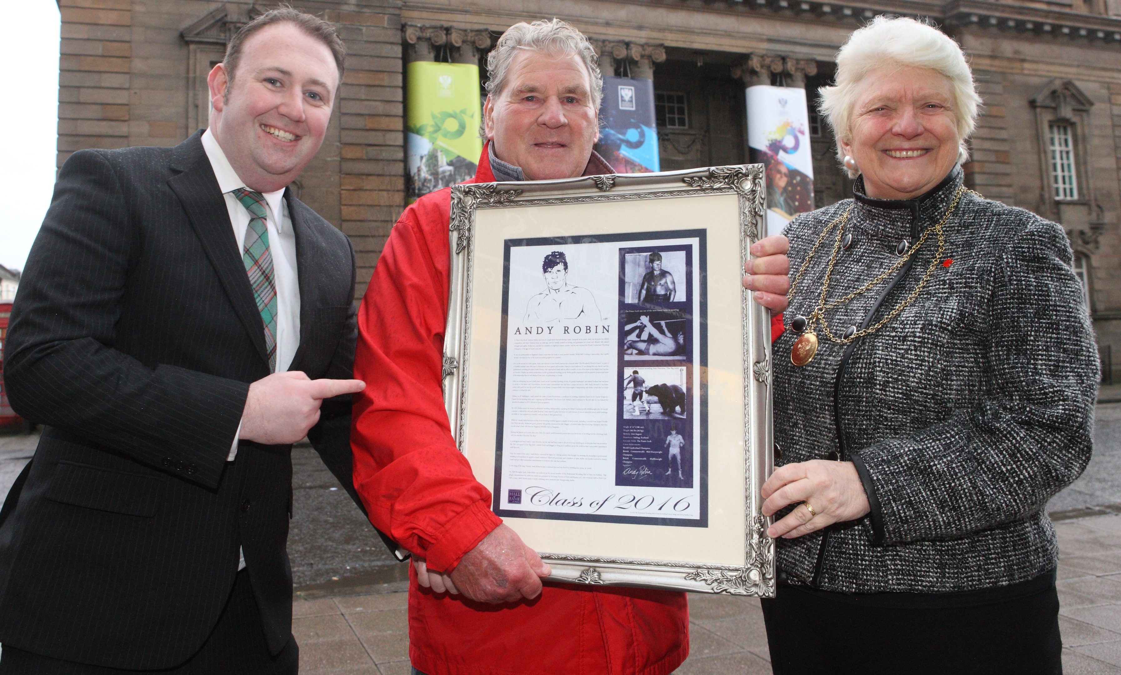 Andy Robin with (left) founder of the Professional Wrestling Hall of Fame Scotland Bradley Craig and (right) Perth Provost Liz Grant.