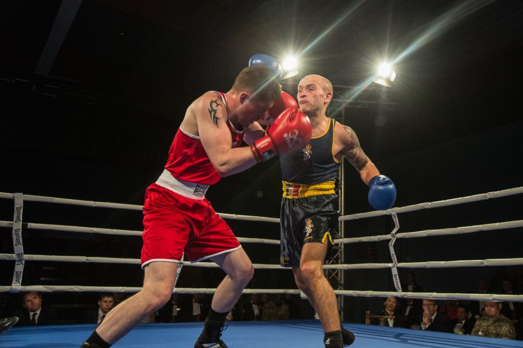 Cpl Ryan Bolam black shorts) fights Lance Corporal Andrew Foster.
