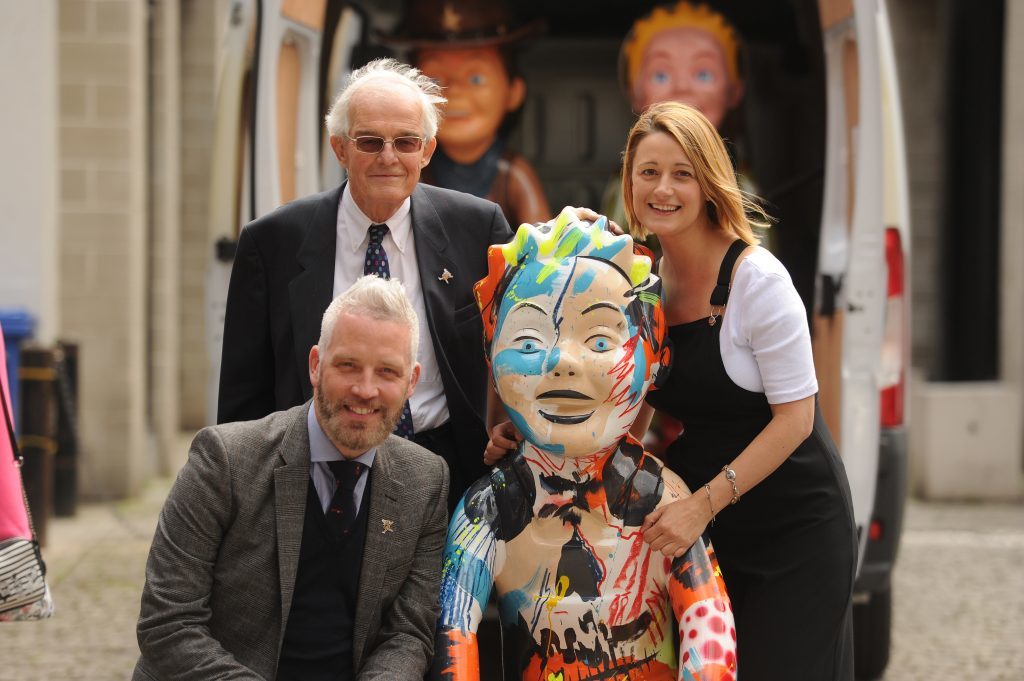 Businessman Garreth Wood, Murray Thomson of DC Thomson and Cassie Thompson at the launch of the Oor Wullie bucket trail.