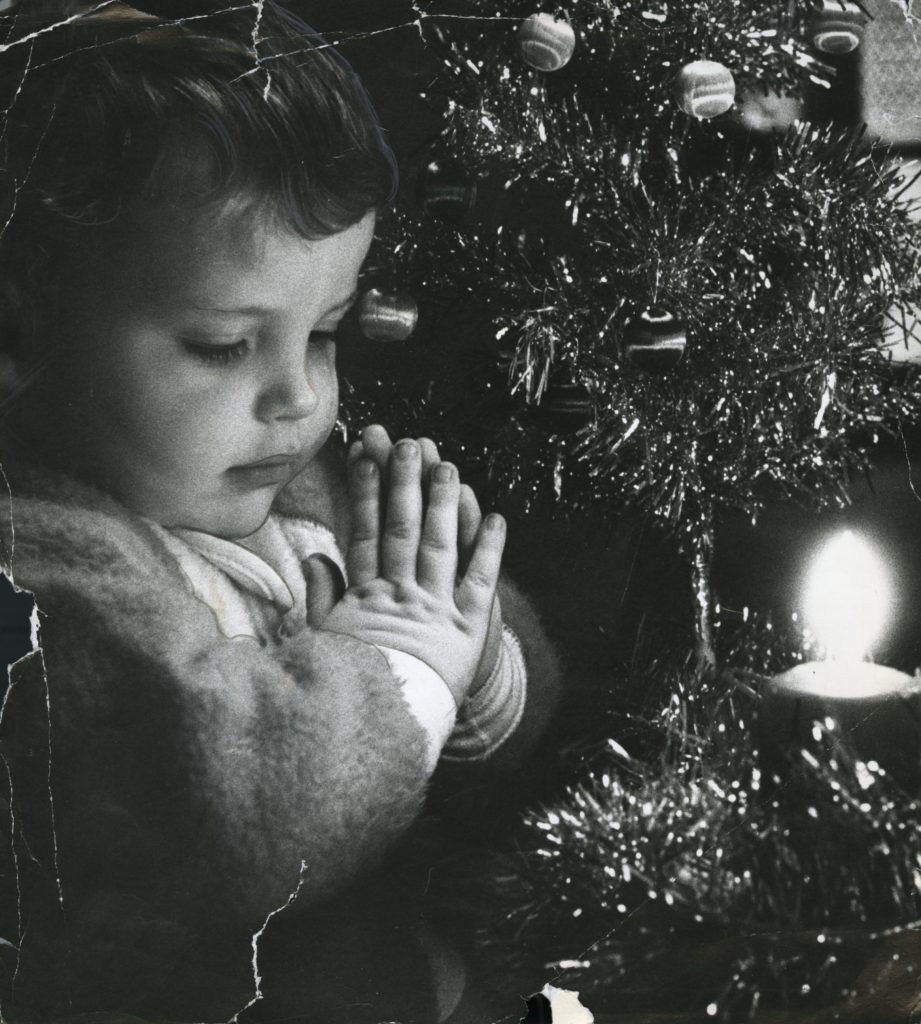 Kristopher Butchart, praying to Santa in 1981.