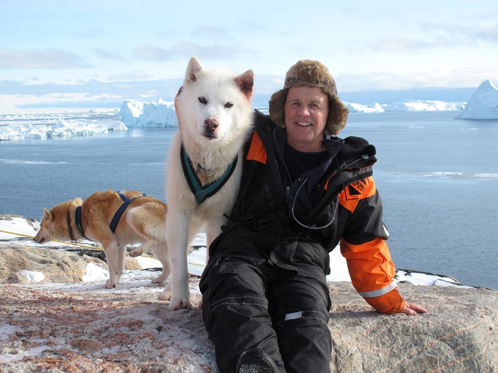 doug-allan-and-husky-greenland