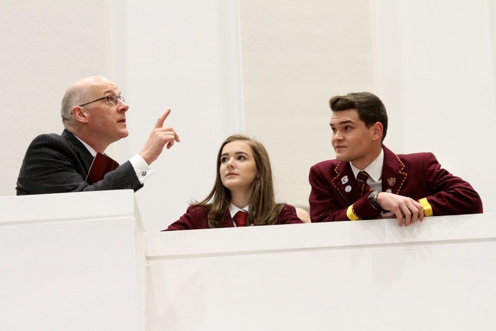 Mr Swinney with head boy and girl Kirsten Ferrier and Sam Pirrie.