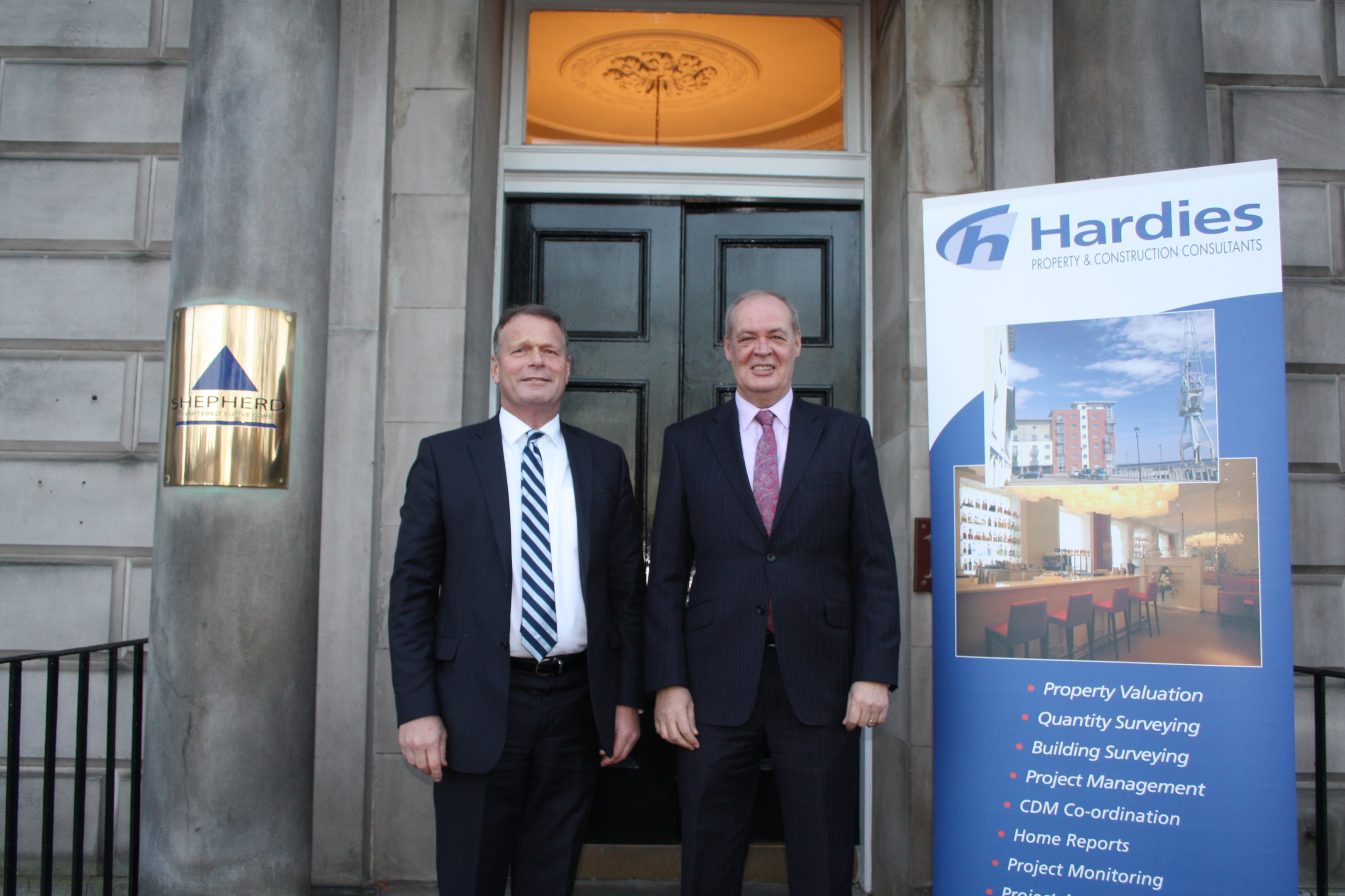 Shepherd Senior Partner George Brewster (left) and Derek Ferrier, Managing Partner of Hardies.
