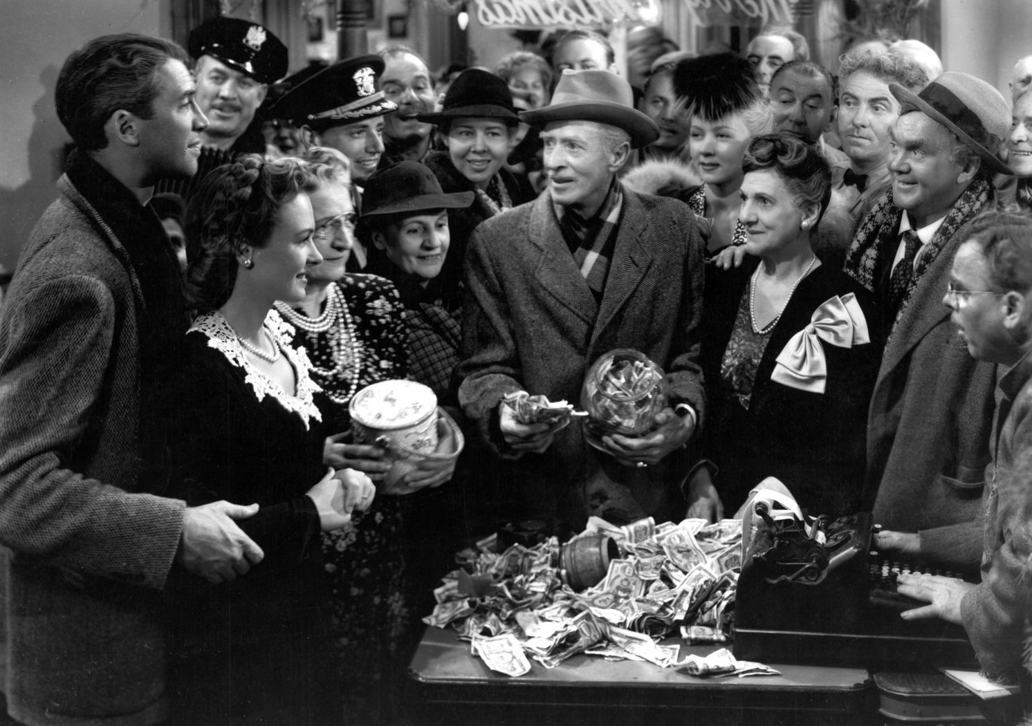 The scene in Its a Wonderful Life where the townspeople support George Bailey, played by James Stewart.