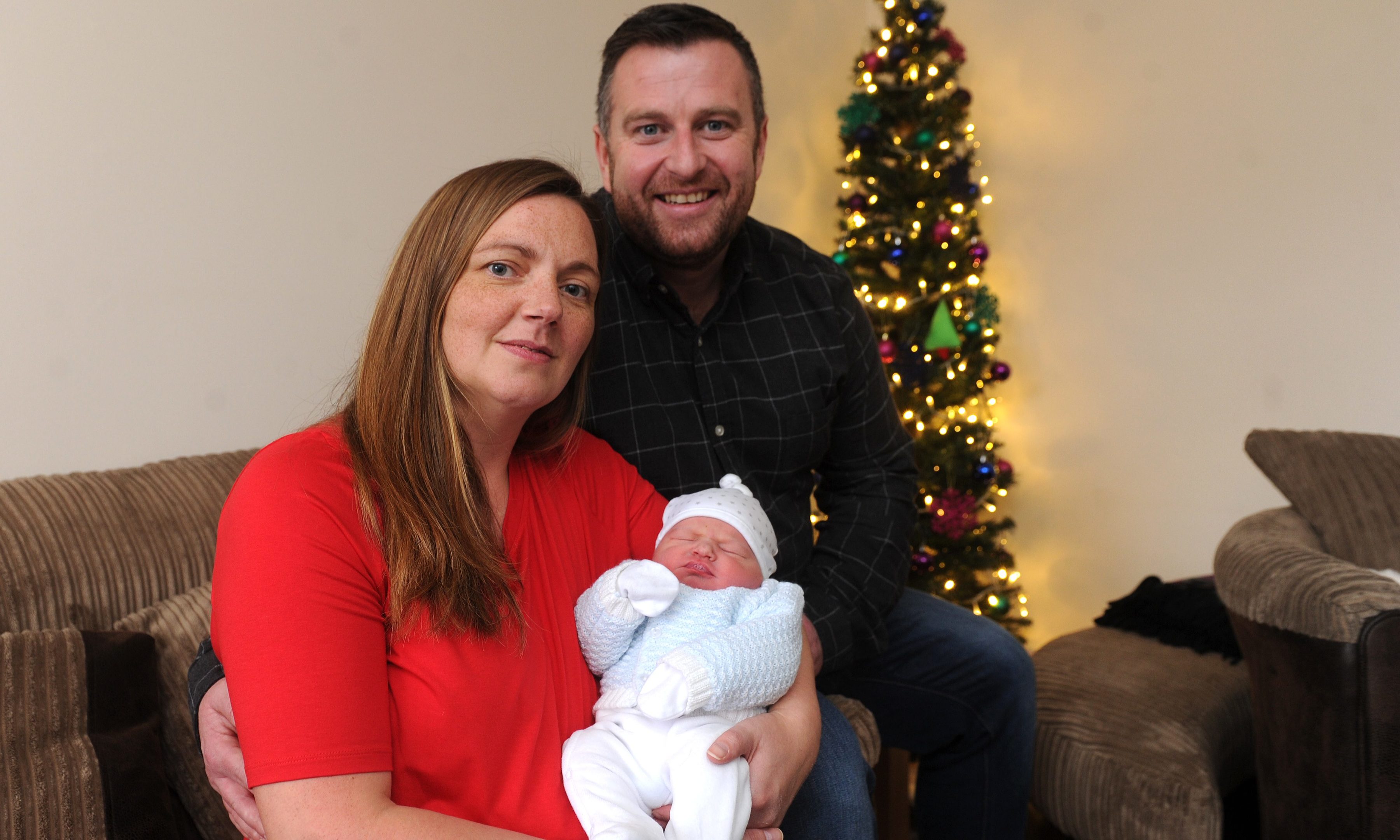 Penny and Callum Stewart with baby Angus.