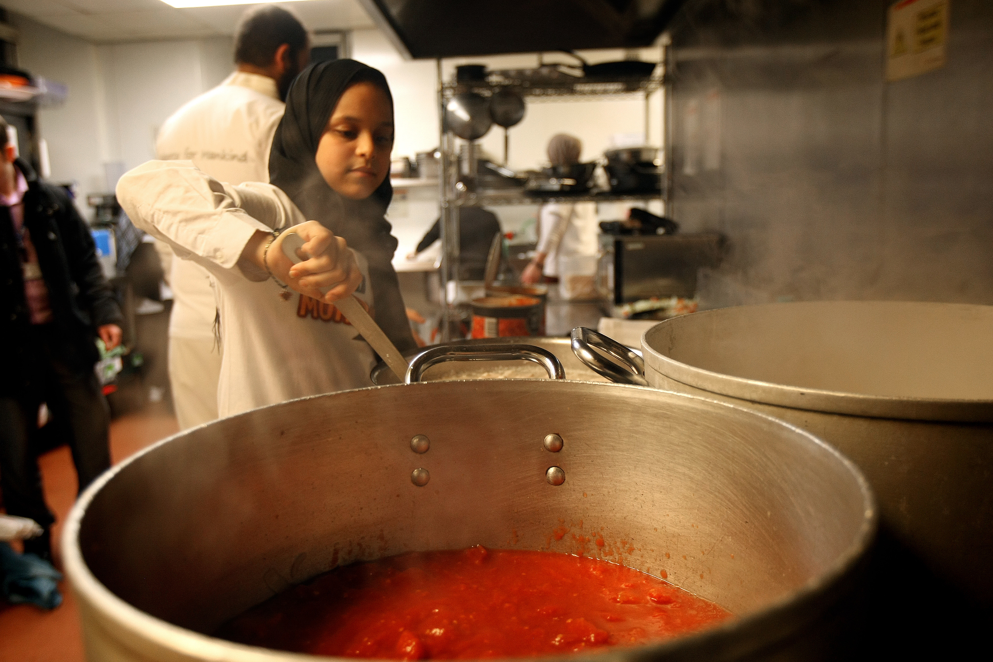 Mariem prepares a hearty curry for people reliant on her help.