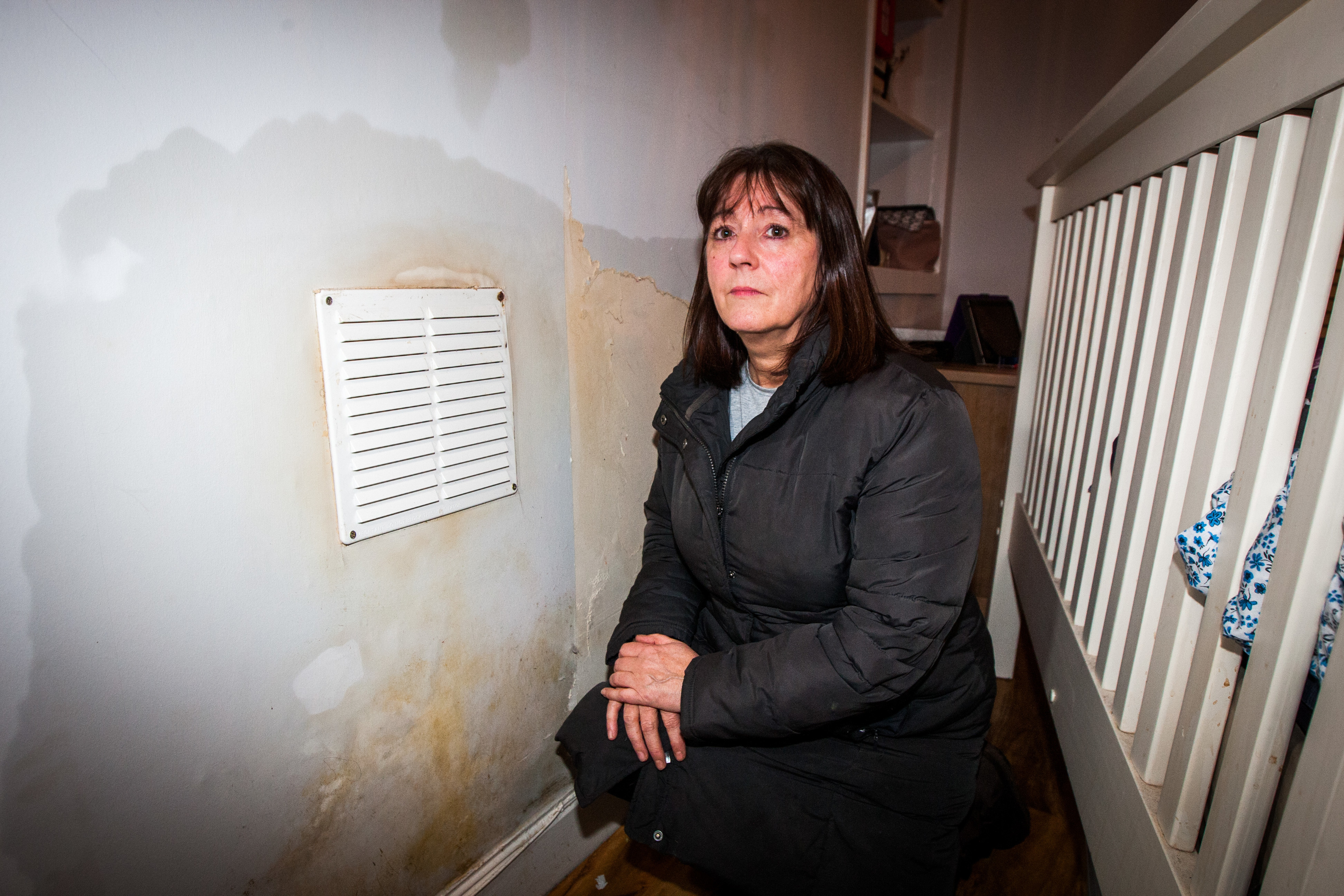 Morag Dickson was left with huge damp problems after work she claims was done by Norman's company.