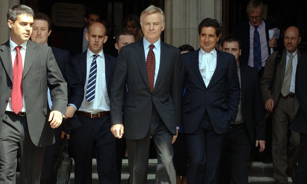 Max Mosley leaves the Royal Courts of Justice after winning a privacy invasion lawsuit against the News of the World in 2008.