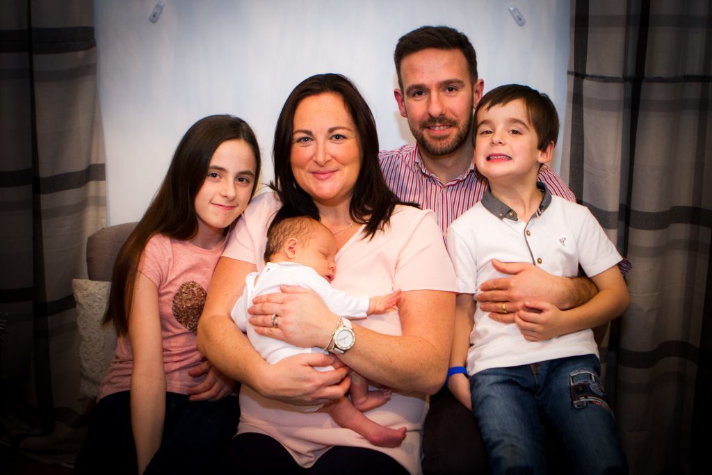 Daughter Bethany and son Benjamin join for another successful family photo.