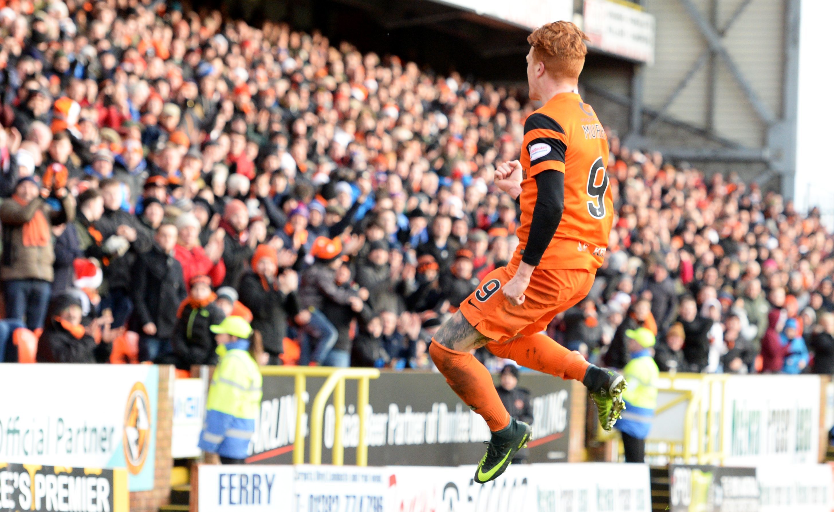 Simon Murray celebrates his goal.