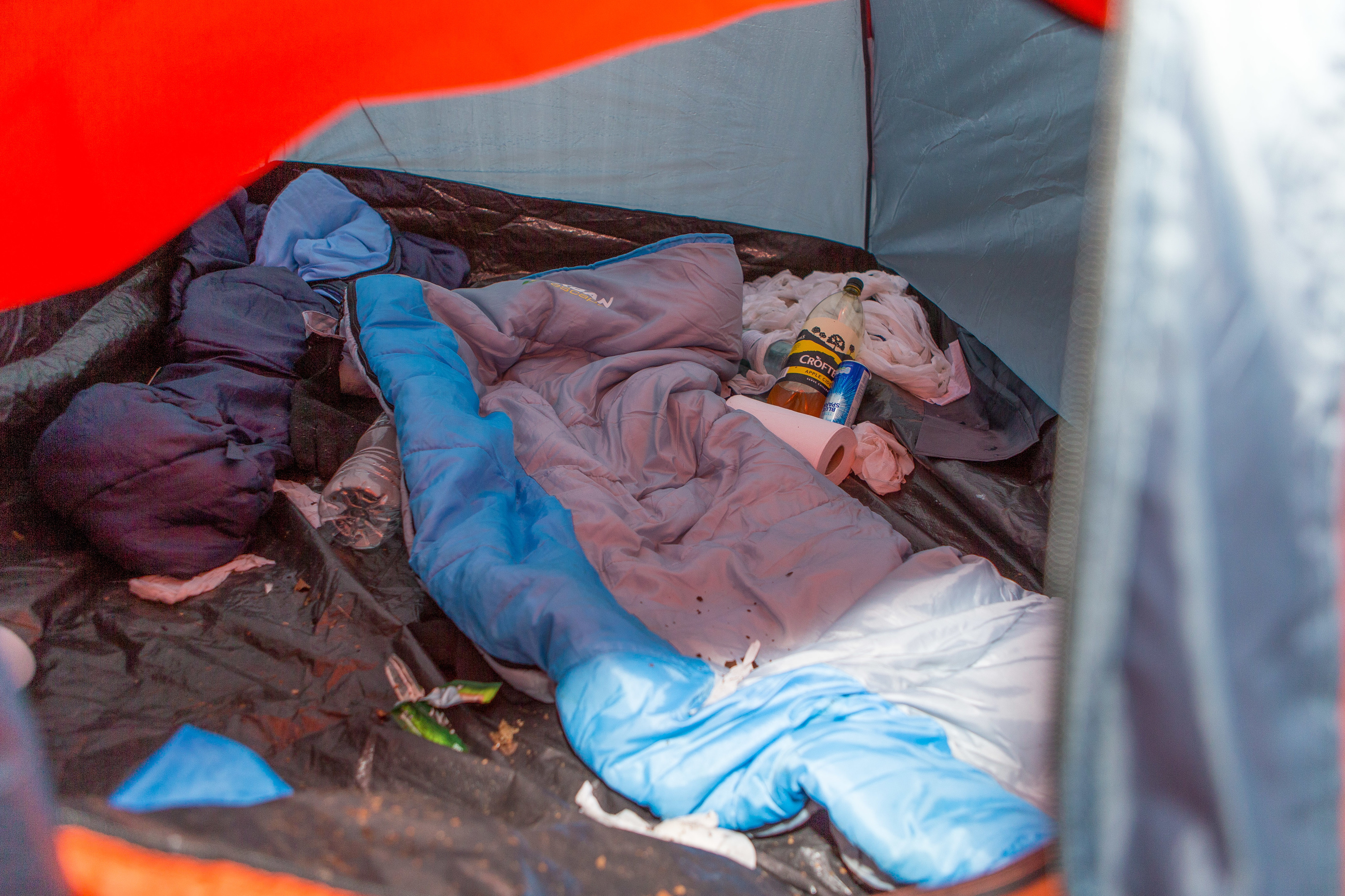 An abandoned tent gives a glimpse of the grim living conditions staff are prepared to endure