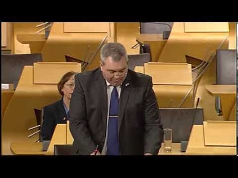 Alex Johnstone speaking at Holyrood.