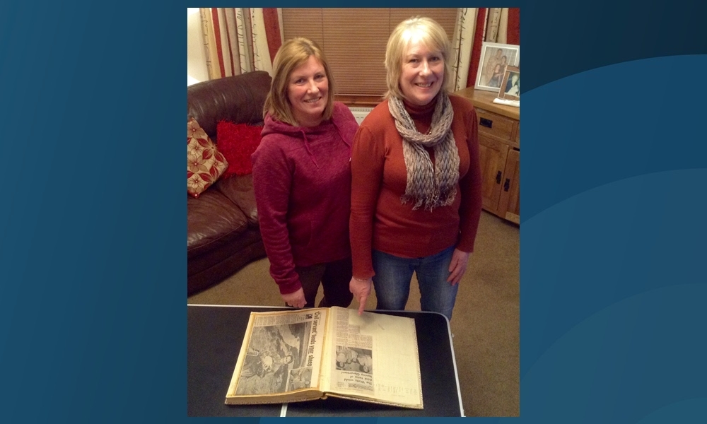 Ann Stewart and Lynn Orrock recalling an article about their family which appeared in The Courier in 1969. The cutting is part of a fascinating journal of the Watt familys life in Glen Prosen.