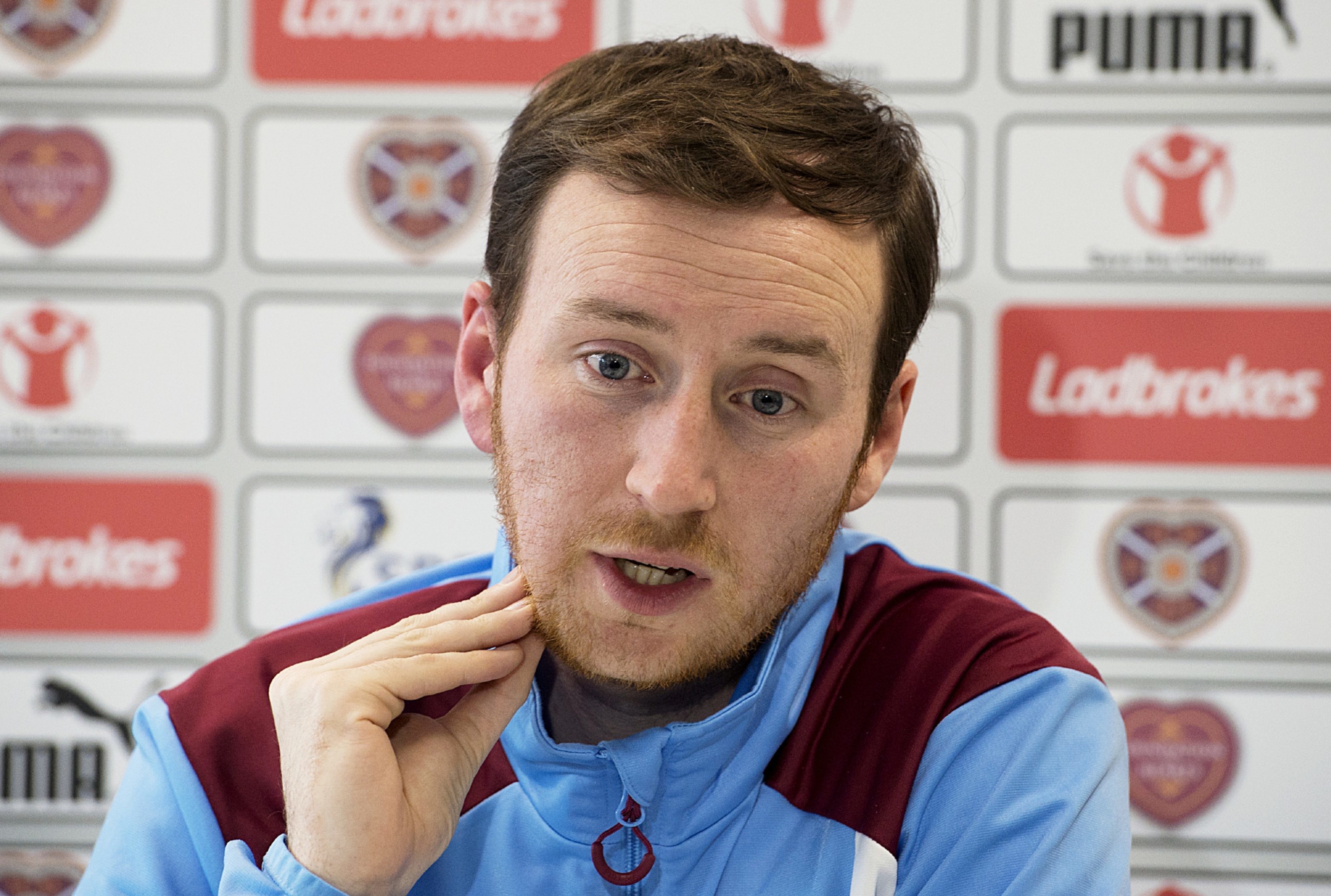 Ian Cathro addresses the media.