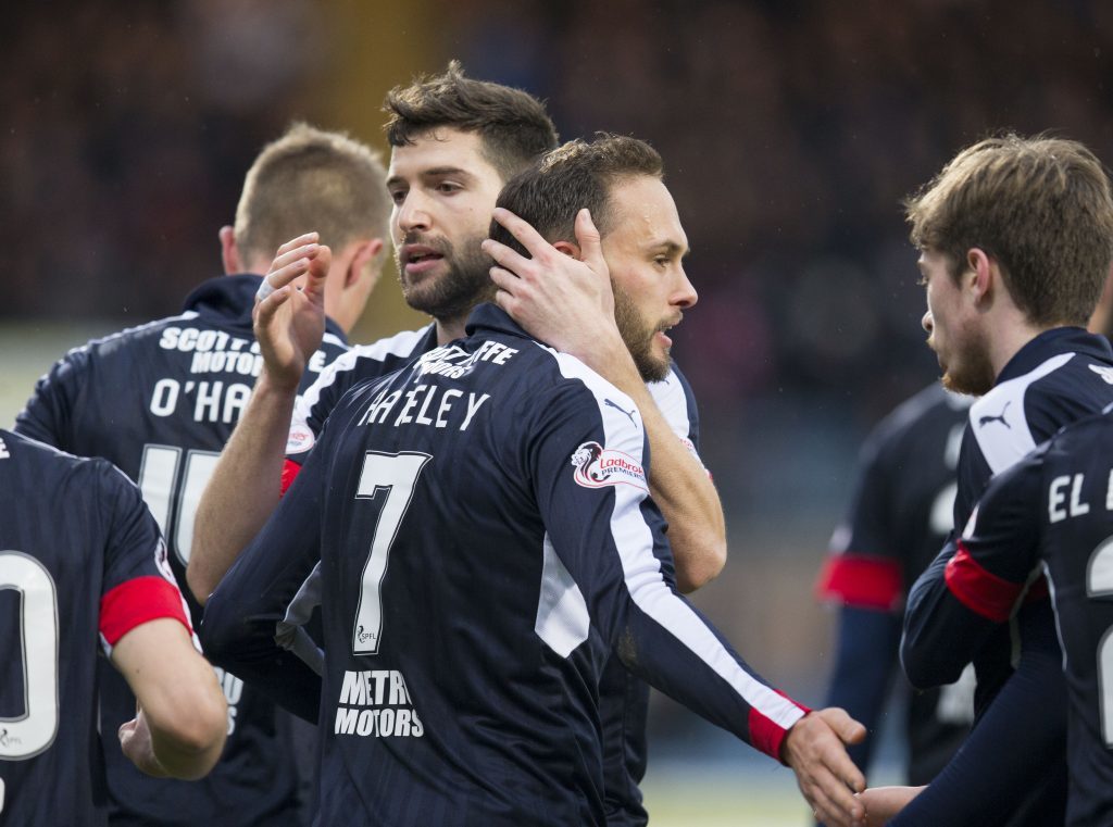 The Dundee players were celebrating a three-goal win in their last league game.