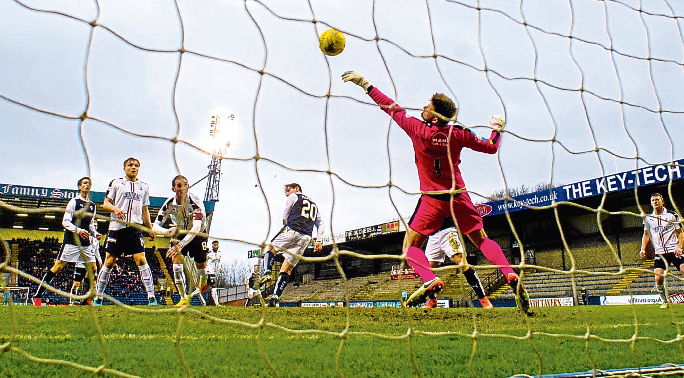 Falkirk's Danny Rogers pull off a save in the first half.