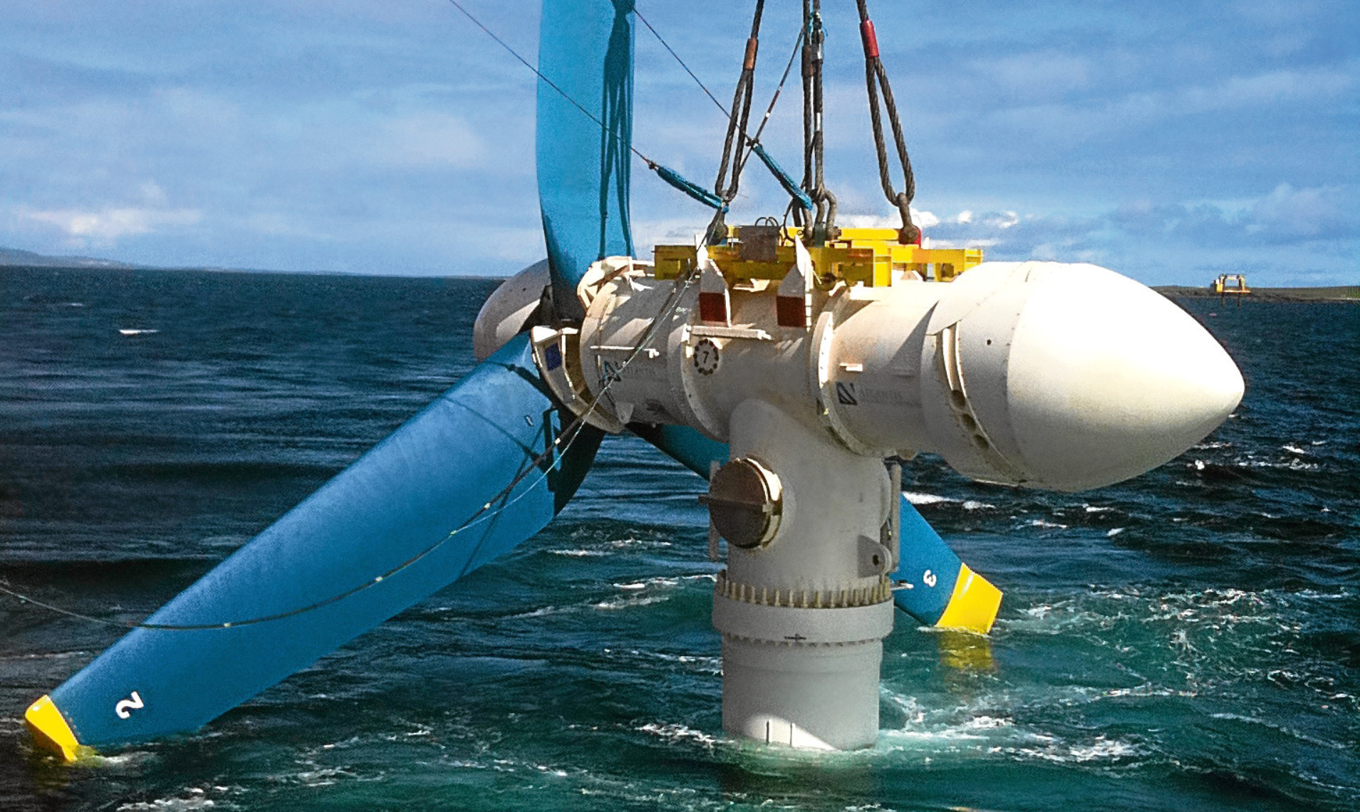 An Atlantis tidal turbine is lowered into the water