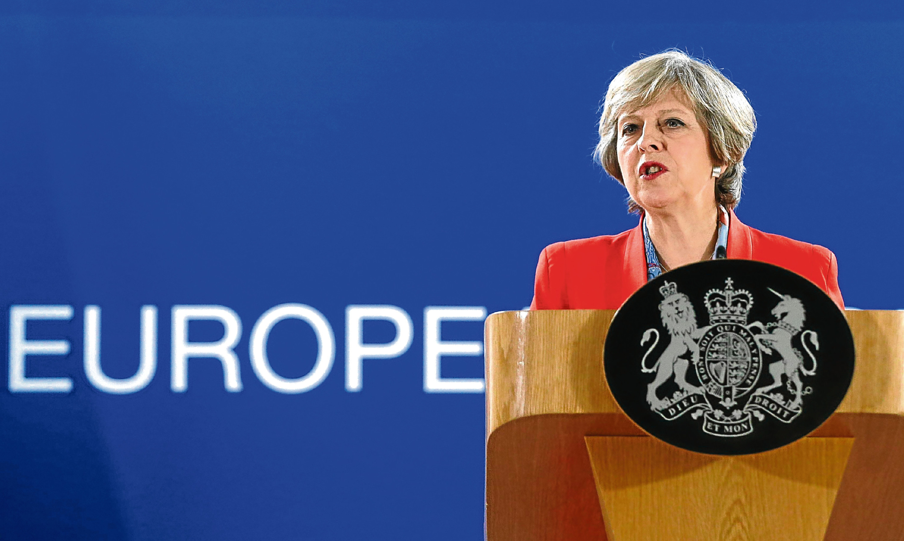 Theresa May answers questions during a press briefing in Brussels in October.