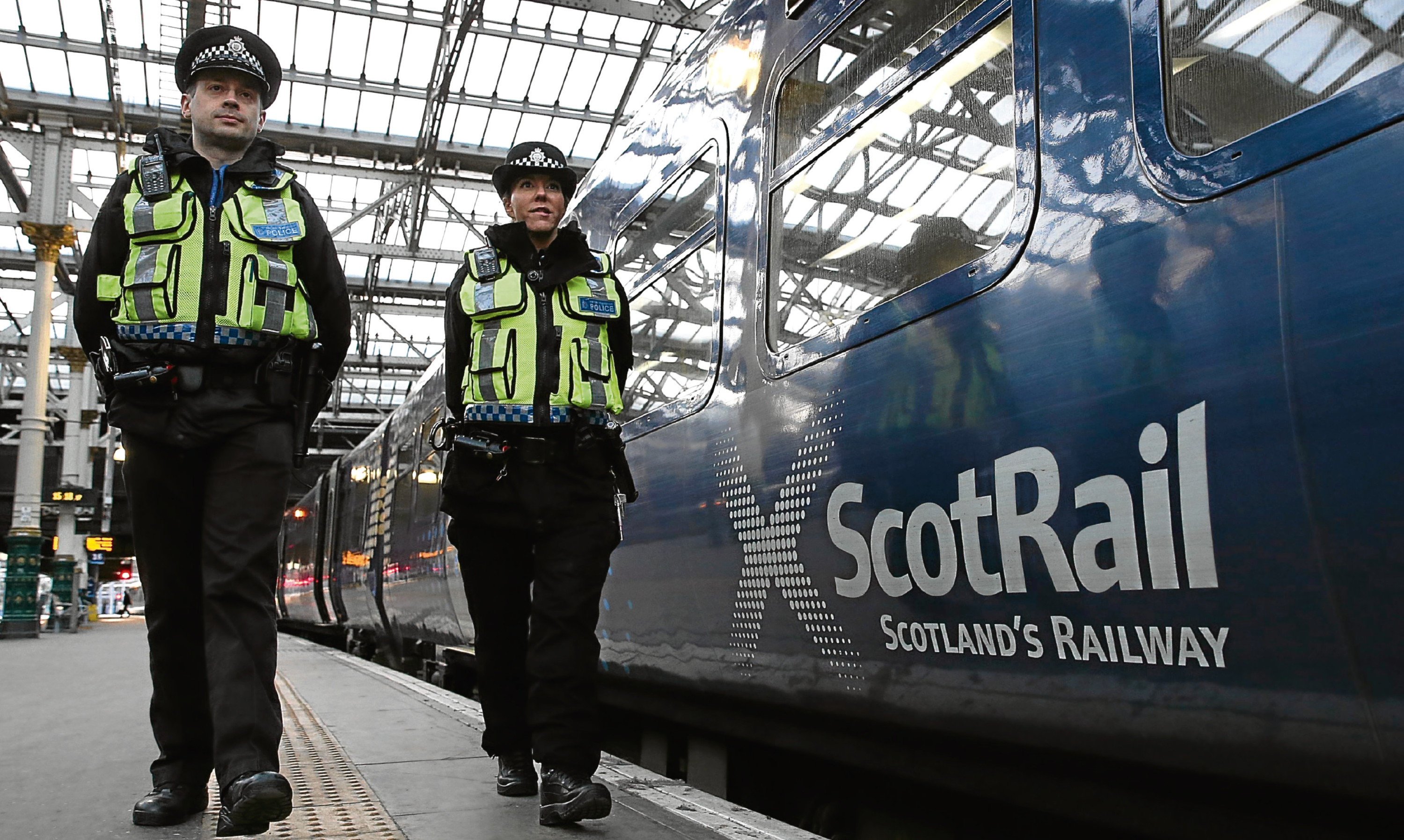 British Transport Police officers on patrol at Edinburgh Waverley.